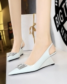 Women's shoes slope High -heeled patent leather shallow pointed metal rhinestone buckle hollowed out and stumbling single shoes